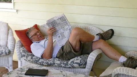 Mature Man Reading A Newspaper Stock Footage 77409271