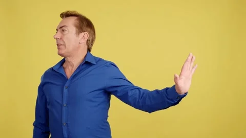 Mature man rejecting while gesturing with his hand Stock Footage 232911289