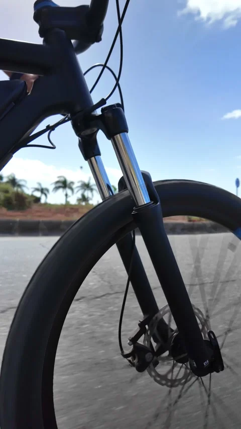 Mature man riding an e-bike outdoors for a healthy lifestyle Stock Footage 344816347