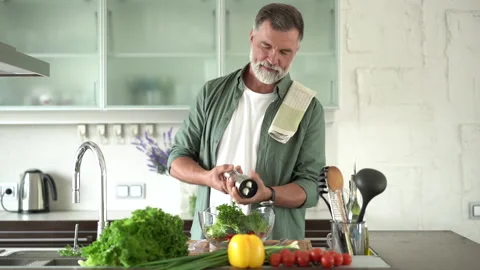 Mature Man Salad Dressing, Single Adult Cooking Vegan Healthy at Home in Kitchen Stock Footage 189796896