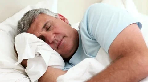 Mature man sleeping Stock Footage 10810799