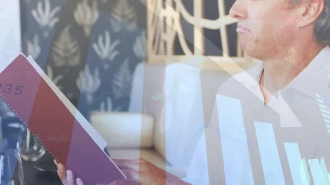 Mature man tapping menu and flipping pages, starting finance overlay with down Stock Footage 333256145