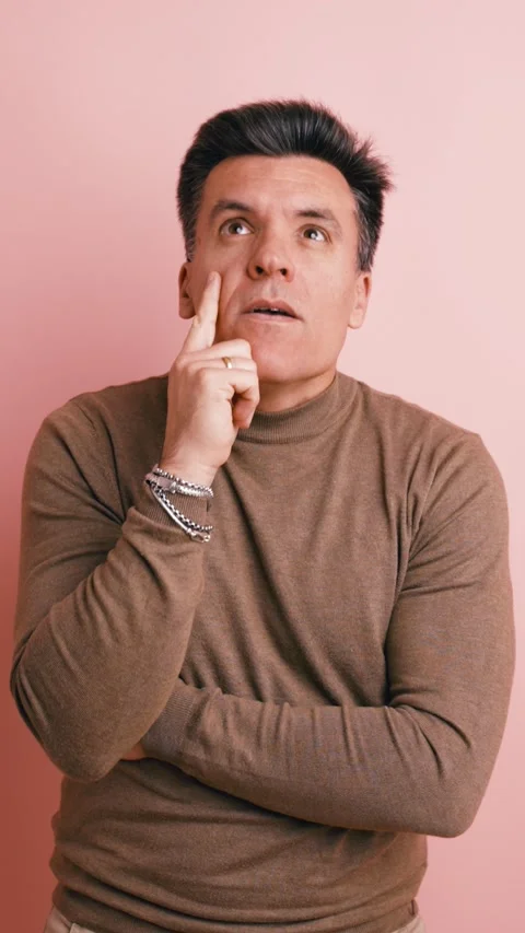 Mature man thinking and finding a great idea. Vertical Video stock 341269848