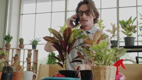 Mature man using digital tablet doing tree business Stock Footage 139248550