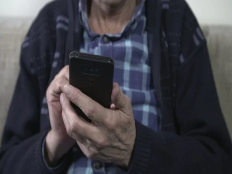 Mature man using a smartphone Video stock 84329546