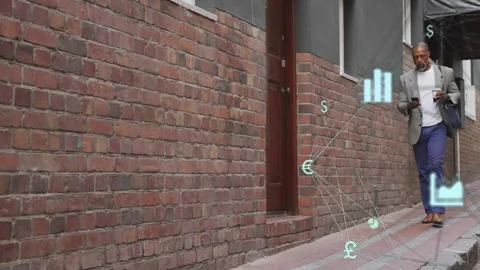 Mature man walking down brick alley, tapping phone and checking market data Stock Footage 333463286