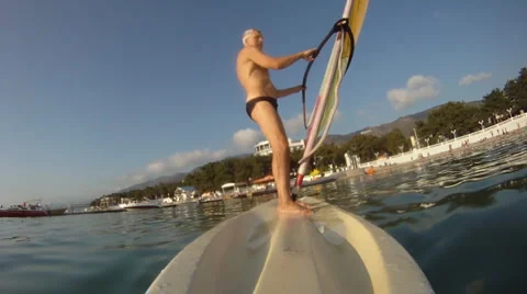 Mature man on the windsurf Video stock 6698497