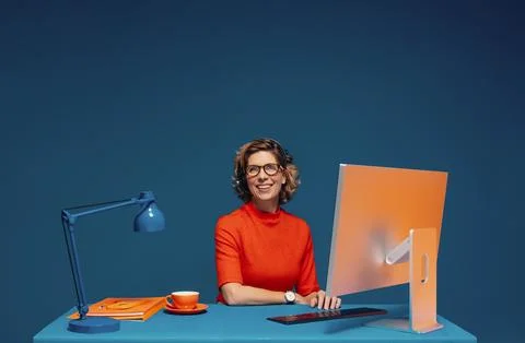 Mature manager posing in an office studio shot Stockfoto's