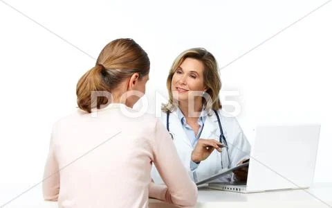 Mature medical doctor woman and patient. Stock Photos