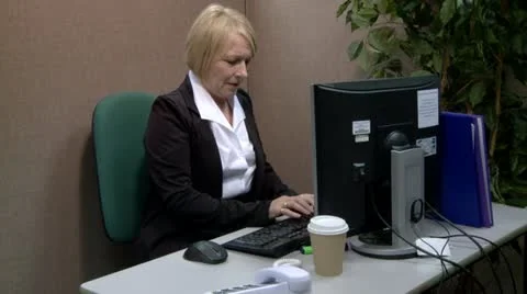 Mature office worker having computer problems Stock Footage 12411645