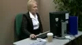 Mature office worker messing about at work HD Footage