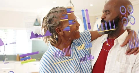 Mature pair holding hands, locking eyes, slow-dancing in kitchen, health charts Stock Footage 321363009
