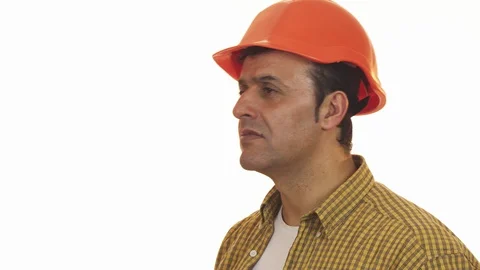 Mature professional builder in hardhat looking disappointed Stock Footage 85975720