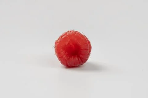 Mature raspberry on a white background Stock Photos
