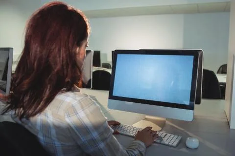 Mature student using computer Foto stock