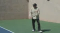 Mature Tennis Pro - slow motion backhand close HD Footage