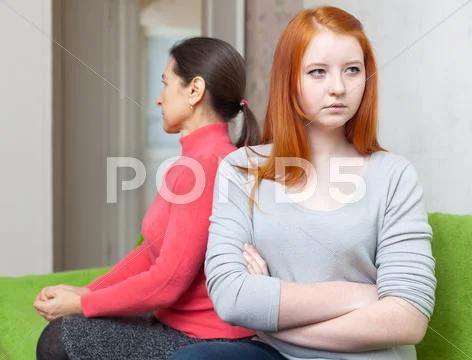Mature woman and daughter having conflict Stock Photos