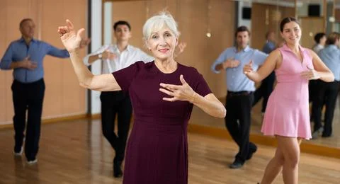 Mature woman dances paso doble Stock Photos