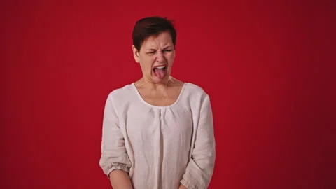 Mature Woman in Disgust, Feeling Repulse... | Stock Video | Pond5