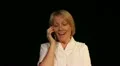 Mature woman gets good news phone call HD Footage