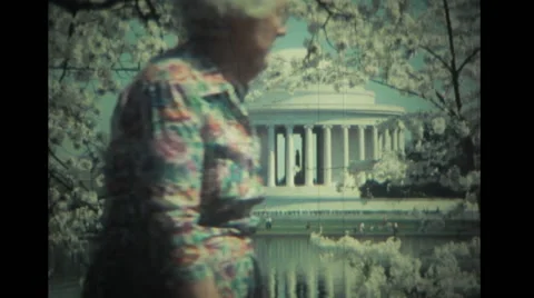 Mature woman lookin at the Jefferson Memorial Stock Footage