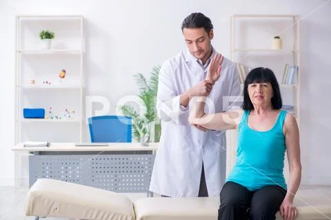 Mature woman patient visiting doctor Stock Photos