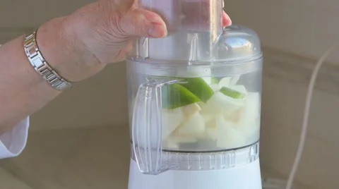 Mature Woman's Using Food Processor Stock Footage 48661916