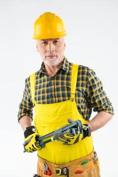 Mature workman in hard hat Stock Photos
