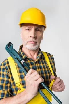 Mature workman in hard hat Stock Photos