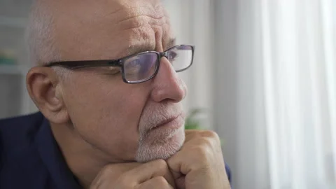 Maturity. Unhappy old man close-up. Stock Footage 219692863