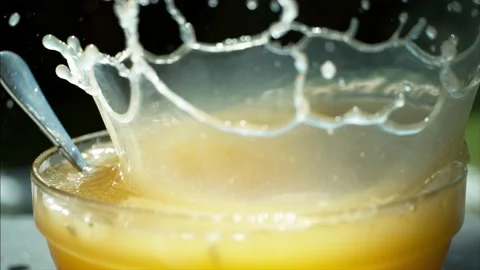 Matzah ball falling into chicken soup - Jewish festival of Pesach or Passover. Stock Footage 177659435
