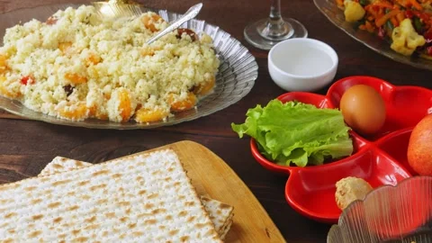 Matzo and kearah on the set table for the Pesach Seder meal. Vertical panoram Video stock 277747032