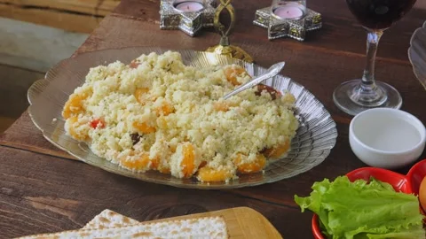 Matzo and kearah on the set table for the Pesach Seder meal Stock Footage 278185710