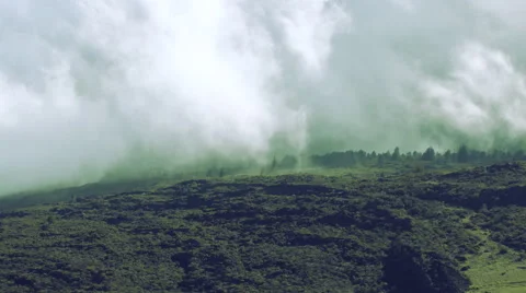 Maui, Hawaii Converging Clouds Over Lush Green Landscape Timealpse 4K UHD Stock Footage 58130751