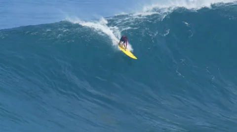 MAUI, HAWAII.  Surfers Ride Giant Ocean Waves Breaking Stock Footage 59195859