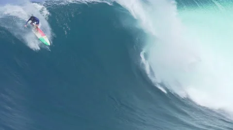 MAUI, HAWAII.  Surfers Ride Giant Ocean Waves Breaking  Stock Footage 59196535