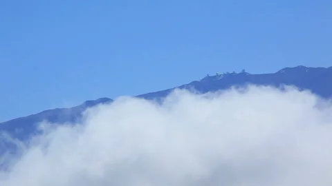 Mauna Kea Summit Observatory and Flowing Clouds Stock Footage 327291916
