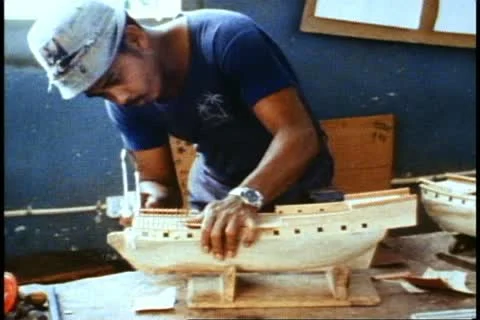 MAURITIUS, 1982, Curpipe, Model boat factory, man with small saw and boat Vídeos de archivo 11156776