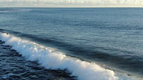 Mauritius island camera moving backward over lineup waves on coral reef Stock Footage 120426813