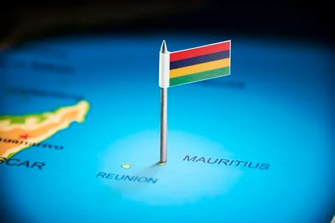 Mauritius marked with a flag on the map Stock Photos