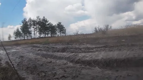 Maverick X3 driving through the puddle with sprays Stock Footage 156655163
