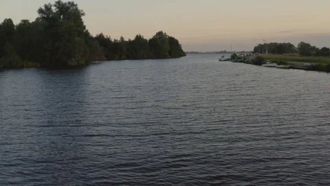 Mavic 2 pro flying low above water, Ringvaart, Canal, The Netherlands Stock Footage 111284280