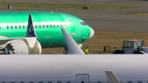 MAX jetliner grounding crisis pushes Boe... | Stock Video | Pond5