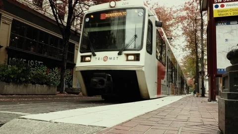 A MAX light rail train crosses the tracks in downtown Portland, Oregon Stock Footage 144189069