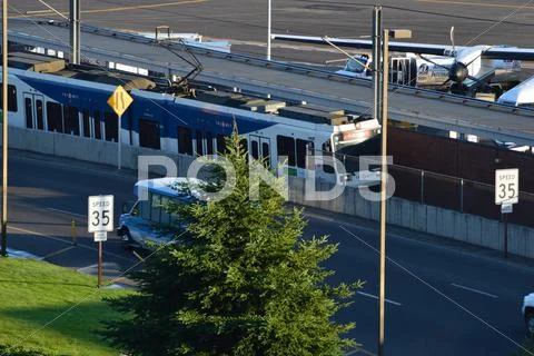 MAX Train approaching Airport Station Stock Photos