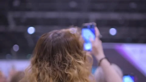 Maximize engagement with your audience by utilizing smartphones to capture live Stock Footage 276598822
