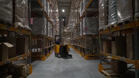 Maximize Warehouse Efficiency with our Versatile Forklift. 스톡 동영상 242700703