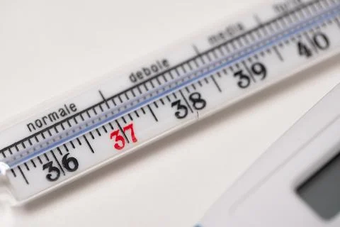 Maximum analog thermometer on white background with numbers for temperature Stock Photos
