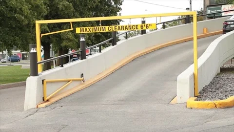 Maximum max clearance six feet foot six inches yellow bar at mall for upper ramp Stock Footage 249756284