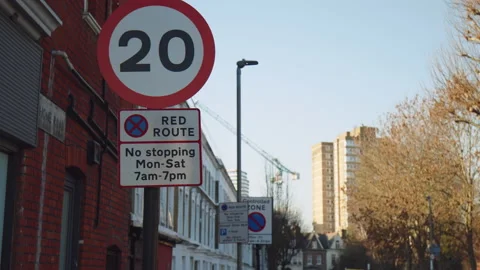 MAXIMUM SPEED LIMIT OF 20 MILES PER HOUR traffic road sign in 4K. Stock Footage 146498939